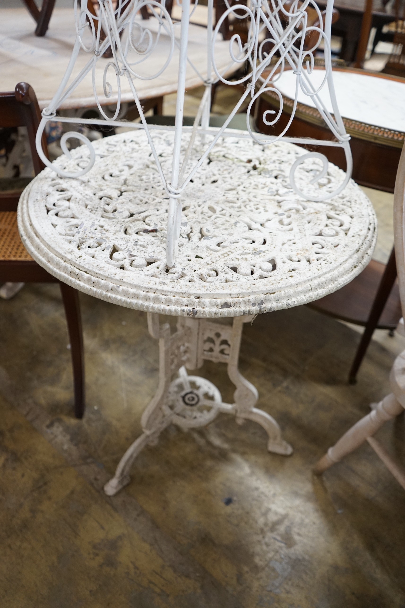 A painted wirework circular garden table and a painted aluminium garden table, larger diameter 60cm, height 70cm